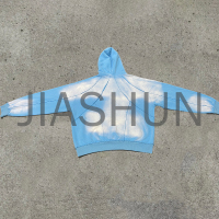 Boxy Hoodie with Distressed Hem and Reversible Design
