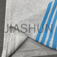 Cotton Terry Flared Sweatpants with Logo Stripe Print