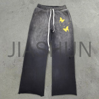 Sun-Faded Cut and Saw Bottom Distressed Sweatpants