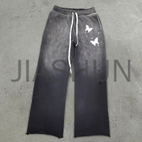 Sun-Faded Cut and Saw Bottom Distressed Sweatpants