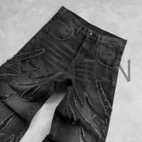 Faded Baggy Jeans with Applique Patch Design