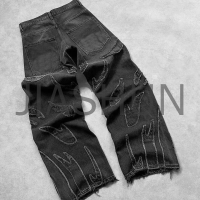 Faded Baggy Jeans with Applique Patch Design